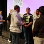 Judges talk with the students after the Final Pitch competition, sharing some last advice about how to get their business off the ground. Photo by Keelin Everly-Lang/The Mirror