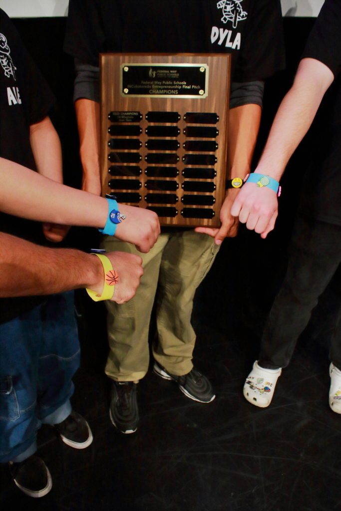 The Interchangeables team shows off their products and award after winning the Final Pitch competition as part of the INCubator program at five high schools in Federal Way. Photo by Keelin Everly-Lang/The Mirror