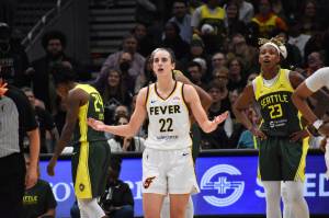 Caitlin Clark of the Indiana Fever shrugs as she looked for a foul on a three-point attempt in the fourth quarter against the Seattle Storm. Ben Ray / The Mirror