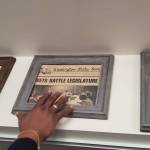 Frank Fields points to a newspaper clipping in his home documenting one of the causes he advocated for in his lifetime.