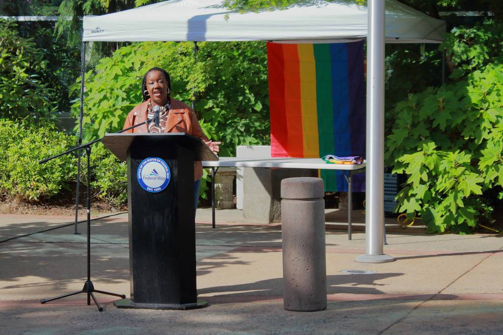 Chair of the Diversity Commission Saudia Abdullah speaks at the Pride flag raising. Photo by Keelin Everly-Lang/The Mirror