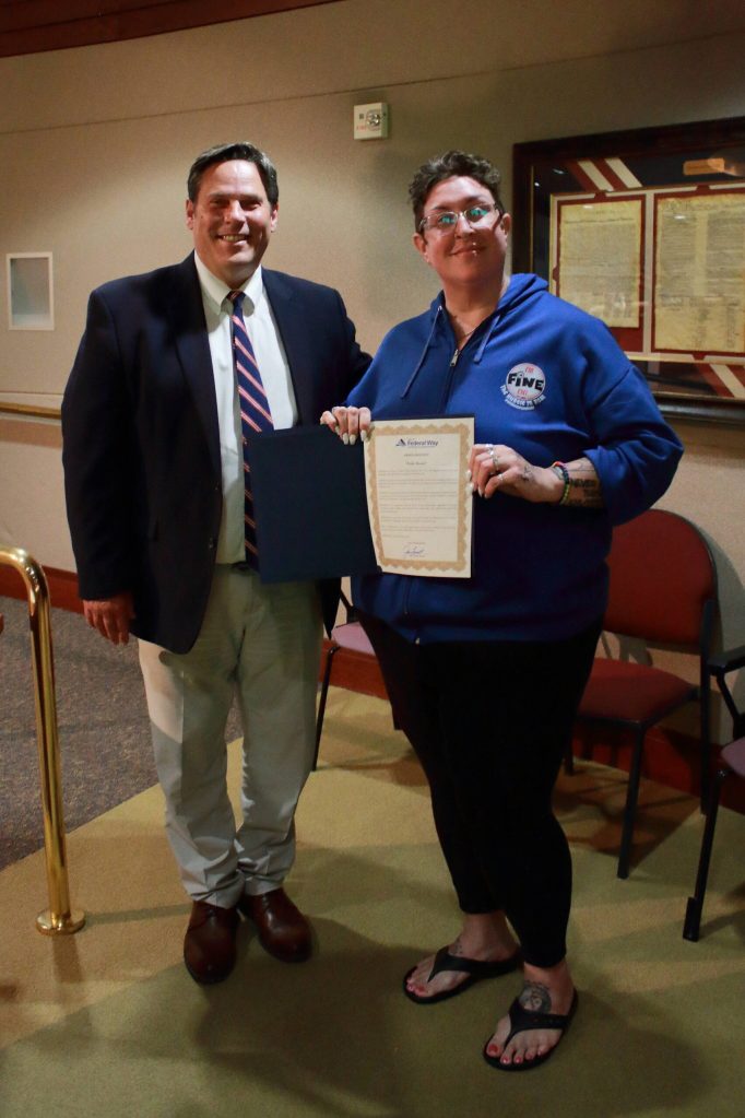 Mayor Jim Ferrell and local resident Allison Fine with the citys proclamation for Pride Month. Photos by Keelin Everly-Lang / The Mirror