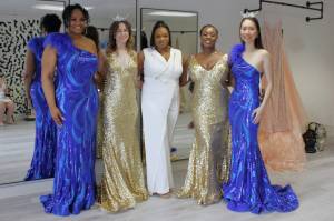 Tasha Mae, Adriana Fachiol, Amber Bruce, Aliyah Lawson and Jerica Huang show off the gowns at The Empress Suite at the stores launch on Saturday, June 8. Photo by Keelin Everly-Lang / The Mirror