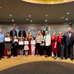 Federal Way City Council posing with the kids being celebrated for their art contributions. Photo by Joshua Solorzano/The Mirror