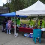 The Lions Club gives out hot dogs on Flag Day at the King County Aquatic Center. Photos By Joshua Solorzano/The Mirror
