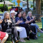 Members of FUSIONs board applaud the ribbon cutting of the Carpenter House. The house is the largest to join a fleet of other homes that the organization utilizes in their transitional housing program. Photo by Keelin Everly-Lang / The Mirror