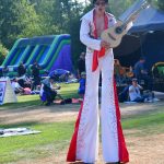 A pair of stilts gave this Elvis impersonator a leg-up on the competition at a past Federal Way Red, White and Blues festival. File photo by Bruce Honda