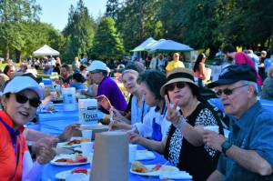Diners gather at the 2022 Salmon Bake at Steel Lake Park. File photo