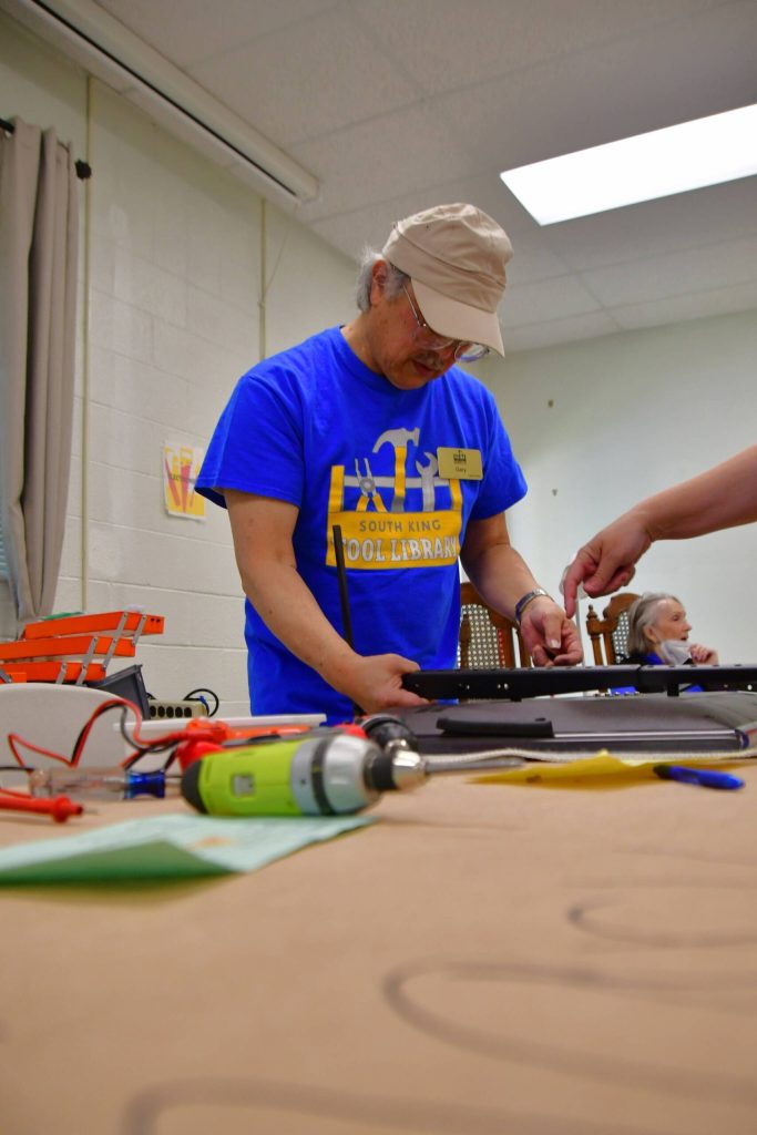 The Repair Cafe at the South King Tool Library on June 29. Photo by Bruce Honda