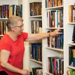 Reading keeps the mind sharp and can foster social bonds if done in a structured group setting like at Village Green Senior Living. Courtesy Village Green Senior Living.