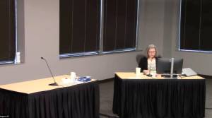 Marcine Anderson reading the interrogatories of the jurors. (Screenshot)