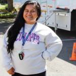 Arleen Marston is the wellness programming manager at PICA-WA. At their third annual health and resource fair July 31 in Federal Way, free mammograms were offered in the truck behind her. Photo by Keelin Everly-Lang / The Mirror
