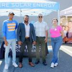 From left to right: Solar Program Coordinator Mateo Arbelaez Arizala, Founder and CEO of Sphere Solar Energy Edwin Wanji, Miguel Maestas of El Centro de la Raza and Jessica Ramirez of Sphere Solar Energy. Photo by Keelin Everly-Lang / the Mirror