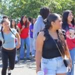 Youth involved in El Centro de la Raza programs head to the rink to skate after joining the ribbon cutting celebration for the new solar panels at the El Centro Skate Rink. Photo by Keelin Everly-Lang / the Mirror