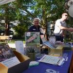 Kimi Dowell with Global Credit Union, a Village Green partner, at a booth during Village Greens National Night Out celebration Aug. 6.