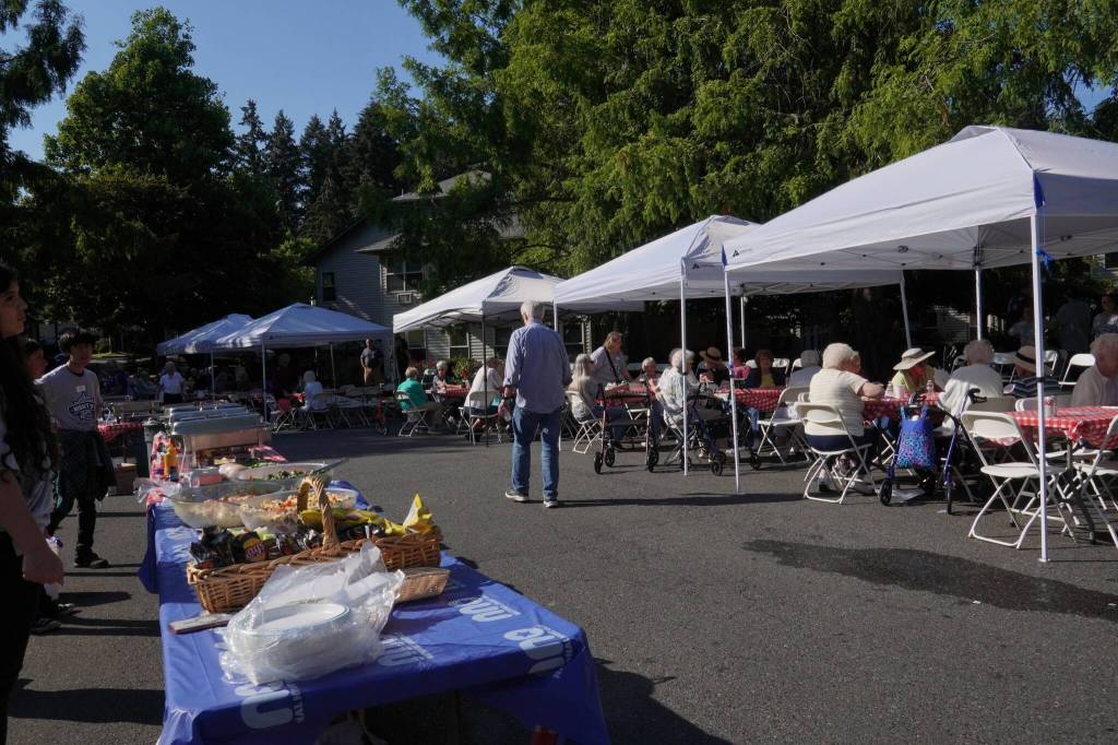 A table where seniors could get some BBQ during Village Greens National Night Out celebration Aug. 6.