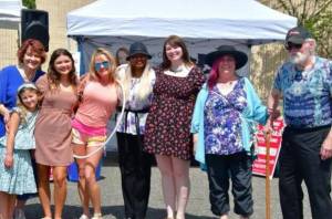 The Federal Ways Got Talent August show was held at the Federal Way Farmers Market and featured an array of singers, musicians, and a mesmerizing hula hoop dance performance that captivated everyone present. On Sept. 7 the top 6 performers will compete for the grand prize of $500 and the opportunity to perform at the Taste of Federal Way on Sept. 28 at the farmers market. Pictured left to right: Meggin Hunt, Anna Sicotorschi, Ilona Tabunscic, Amme Harestad, Mary Roberts, Karly Burmark, Tamara Young, John Peterson. Photo courtesy of Bruce Honda