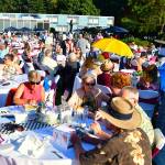 The lawn was packed with guests at FUSIONs Annual Gala - this year with an Alice in Wonderland theme and a new jumbotron screen to share their story throughout the night. Photo by Bruce Honda.