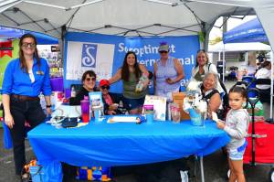 Soroptimist International of Federal Way hosted at booth Aug. 17 at the Federal Way Farmers Market. Soroptimist is a global volunteer organization that provides women and girls with access to the education and training they need to achieve economic empowerment. Photo by Bruce Honda