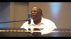 Mark Smith performing with Voices of Rejoice. Photo courtesy of Maya Smith