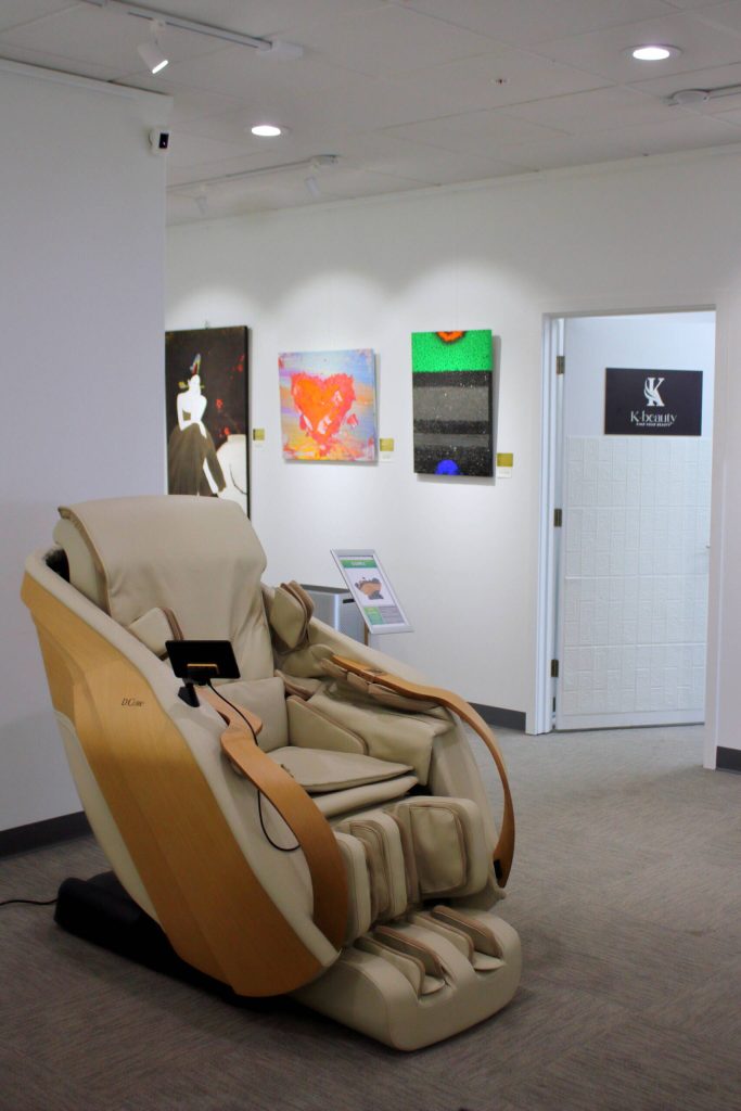 Luxury massage chairs fill much of the space within Gallery K and a door along the gallery wall leads into a beauty salon specializing in Korean beauty products and techniques. Photo by Keelin Everly-Lang / the Mirror
