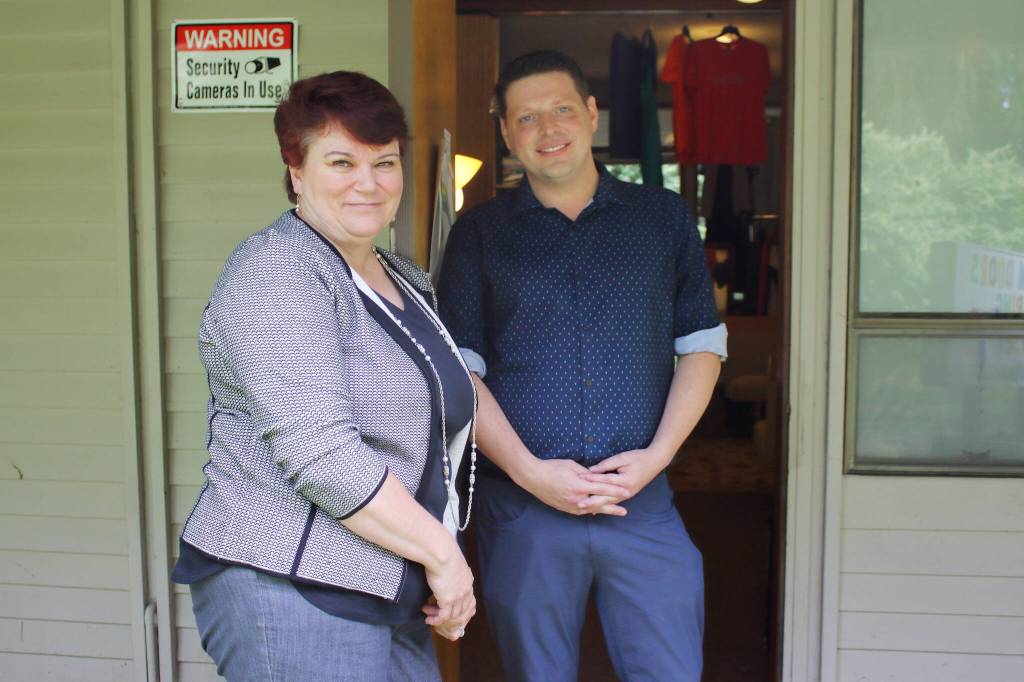 Mimi Meeker has led the project to create the closet, shown here with Christopher Landers-Agosto, who has volunteered a lot of time and effort to help create it.