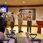 Boy Scouts led the Pledge of Allegiance at the City Council meeting, helping them earn badges for civic duty and communication. Photo by Bruce Honda