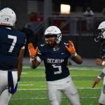 Decatur linebacker Sefa Leapai celebrates a tackle for loss. Ben Ray / The Mirror
