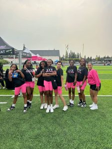 The Phenomenal She Dance Team poses at this years Back to School Block Party held by Phenomenal She on Sept. 7 at the Memorial Stadium. The event featured a resource fair, free backpacks, food, free hair cuts and more. Photo provided by Phenomenal She.