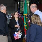 Quentin Morris and Melissa Hamilton speak with Councilmember Jack Walsh and his wife Judy at the 9/11 memorial tribute. Photo by Keelin Everly-Lang / the Mirror