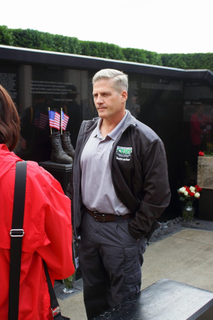 Federal Way Emergency Manager Kevin Pelley at the 9/11 memorial wall in Federal Way. Photo by Keelin Everly-Lang / the Mirror