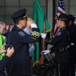 Federal Way Police Department Chief Andy Hwang salutes during the National Anthem. Photo by Keelin Everly-Lang / the Mirror