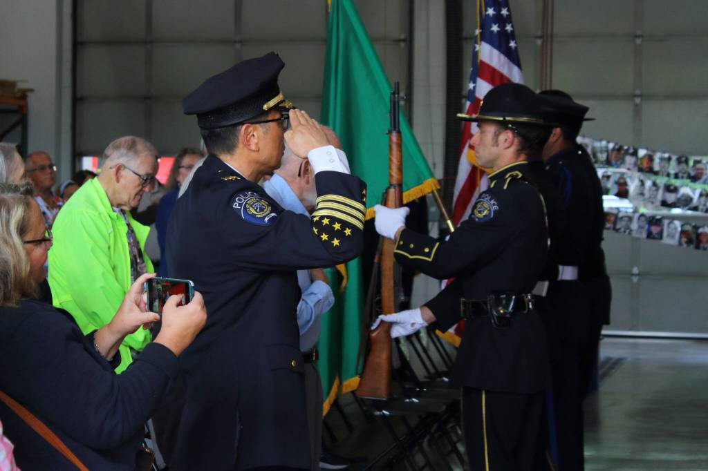 Federal Way Police Department Chief Andy Hwang salutes during the National Anthem. Photo by Keelin Everly-Lang / the Mirror