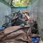 Trash was dragged a quarter mile out to the street where it was loaded up to be hauled away. Photo provided by Stand Up Federal Way Community.
