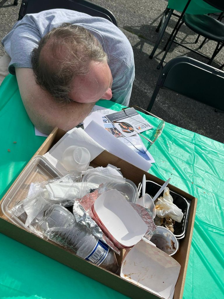 Some people rested after they ate at the Taste of Federal Way 2024.