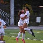 Jazmyne DuBose and Athena Amor Katsaros celebrate a goal against Federal Way. Photos by Ben Ray / The Mirror