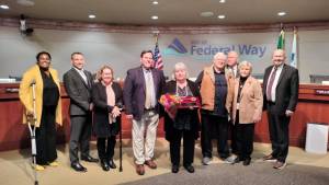 In other action at the Federal Way City Councils Oct. 1 meeting, Diana Noble-Gulliford (center) received the Mayors Key to the City for nearly 40 years of service to the community. She is a former councilmember, planning commissioner and past director of the Historical Society of Federal Way. Photo courtesy of Bruce Honda