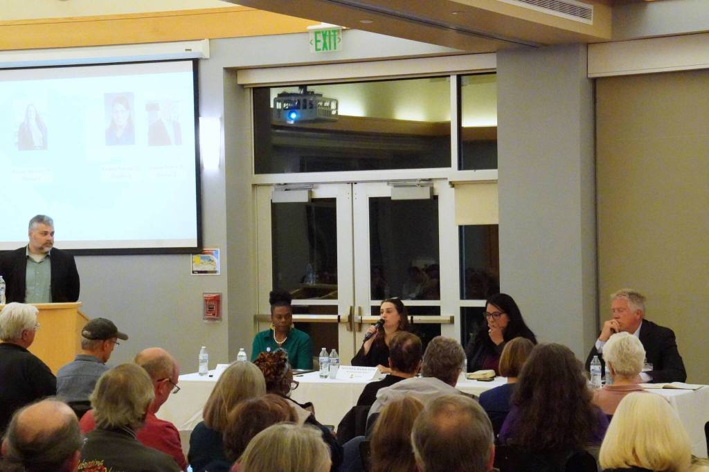Federal Way Mirror Editor Andy Hobbs at the podium while the candidates answered questions Oct. 8 at the Federal Way Community Center. Photo by Joshua Solorzano/The Mirror