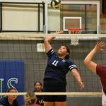 Kiana Smiley goes for the spike against Kentlake. Ben Ray / The Mirror