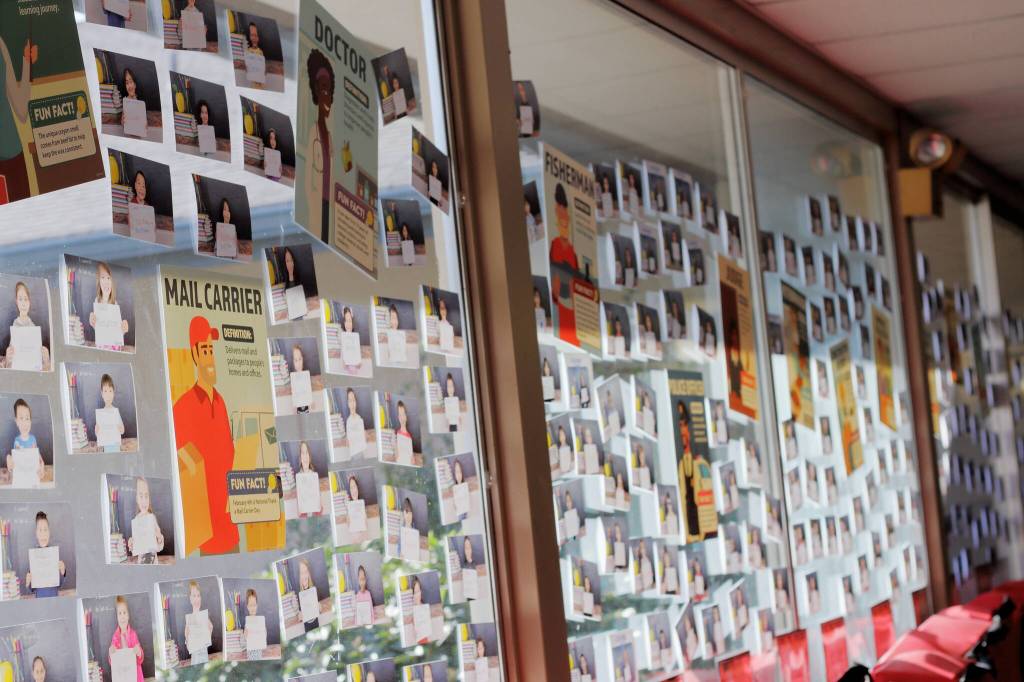 To help kids build their dreams, Adelaide decorated their entrance hall windows with photographs of students holding signs with their future career goals. Photo by Keelin Everly-Lang / the Mirror