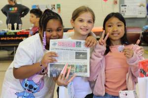 Adelaide students stopped by the Mirrors table to decorate notebooks and learn about a career in journalism at the career fair this year. Photo by Keelin Everly-Lang / the Mirror