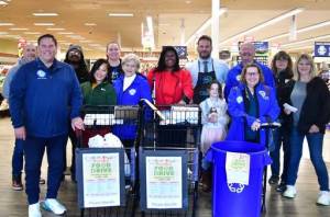 A scene from the Mayors Month of Concern Food Drive on Oct. 12 where donations were collected at Fred Meyer in Twin Lakes and Grocery Outlet in Dash Point. Photo by Bruce Honda