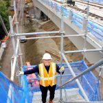 Mayor Ferrell stands on construction stairs as he tours Structure C between the Kent and Star Lake stations that are scheduled to open in 2026. Photo by Keelin Everly-Lang / the Mirror