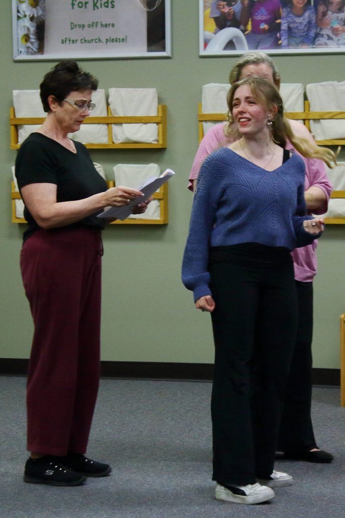 Actors run a scene, blocking out where they will move on stage for the upcoming production of The Wizard of Oz by St. Lukes Theatre in Federal Way. Photo by Keelin Everly-Lang / the Mirror