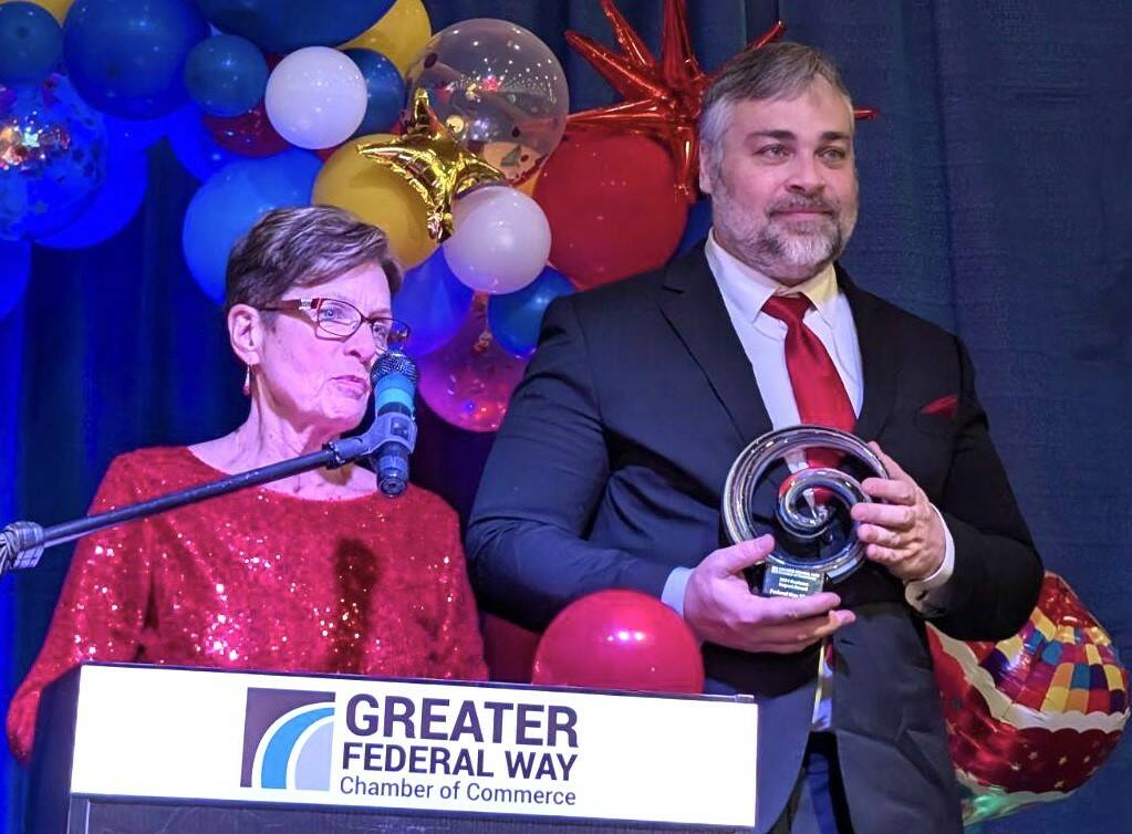 Cindy Ducich and Andy Hobbs of the Federal Way Mirror accept the Business Impact Award at the Greater Federal Way Chamber of Commerces fundraising gala Nov. 16. Courtesy photo