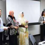 Program Coordinator at Mujer al Volante Elisa Philippe and founder of Mujer al Volante Jaqueline Garcia Castillo join interpreters to congratulate the Arabic speaking cohort on completing their class. Photo by Keelin Everly-Lang / the Mirror