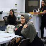 Nooriya Assi Sulaman is a graduate of the Mujer al Volante driving instruction class in Federal Way. Behind her are two of the Mujer al Volante staff.