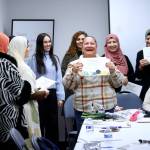 Abeer Haleem Awadalaa Rezkalaa receives her graduation certificate at Mujer al Volante on Nov. 11. Photos by Keelin Everly-Lang / the Mirror
