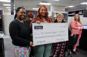 Learning Leaders KaShayla Jewell and Rhonda Young present the check to Center Director and Case Manager for the Genesis Project Dehystinee Davis. Photo by Keelin Everly-Lang / the Mirror