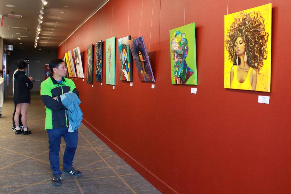 The Arts Explosion event returned for the second year May 31 to June 2, featuring a juried art contest and more. Sculptures, music, paintings, photographs and even a live bonsai tree were some of the many varied forms of art represented at the Arts Explosion this year. Pictured: Art filled the lobby of the Performing Arts and Event Center. File photo